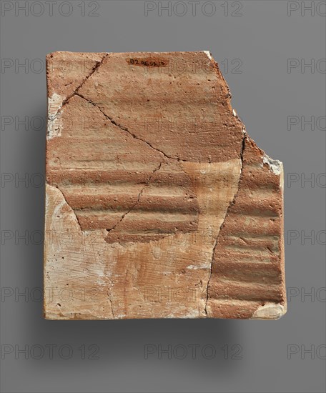 Body Fragment of a Relief Pithos; Crete, Greece; 650 - 625 B.C; Terracotta; 18.5 × 18 cm, 7 5,16 × 7 1,16 in