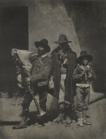 Group of Three Italian Street Musicians in front of 21, Quai Bourbon, Paris; Charles Nègre, French, 1820 - 1880, negative