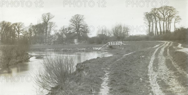 Kelmscott Manor, From the Thames; Frederick H. Evans, British, 1853 - 1943, 1896; Lantern slide; 3.5 x 6.7 cm