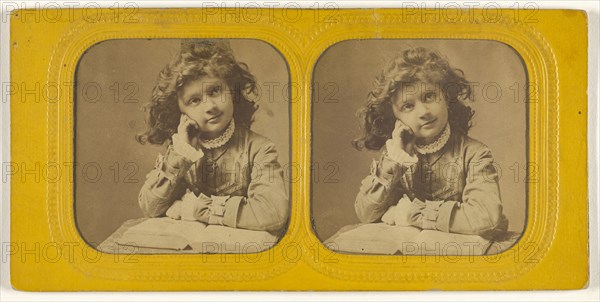 Little girl seated with hand on cheek, open book in front of her; 1855 - 1860; Hand-colored Albumen silver print