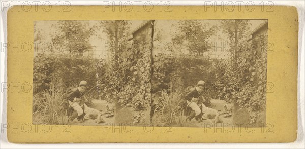 Boy in riding outfit playing in garden; about 1860; Albumen silver print