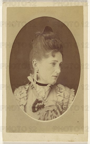 Woman in three-quarter profile; J. J. Abbott; about 1870; Albumen silver print