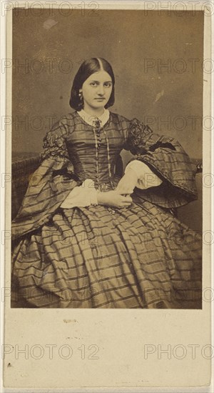 Young woman in striped dress, seated; 1860s; Albumen silver print