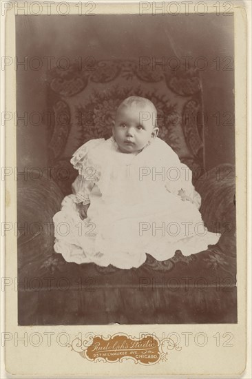 Baby girl in white dress, seated; Louis Rudolph, American, active 1890s, about 1890; Gelatin silver print