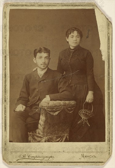 Portrait of a young couple: man seated and woman standing; M.W. Straschuner, Russian, active Moscow, Russia 1870s, about 1880