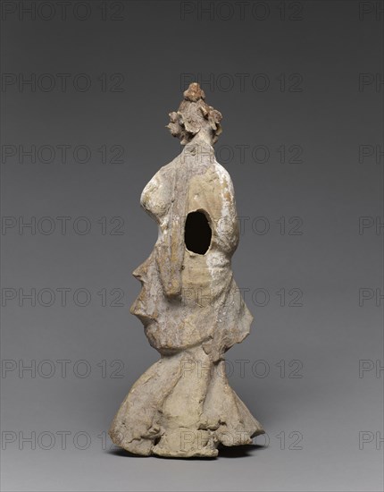 Statuette of a Dancer; Tarentum, Taras, South Italy; 400 - 200 B.C; Terracotta with white slip, white lead, and polychromy