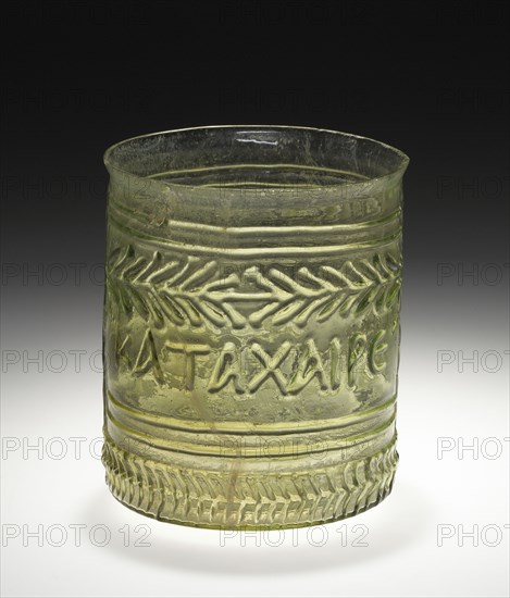 Green Cup with a Greek Inscription:  Rejoice and be merry; Eastern Mediterranean; 1st century; Glass; 7.8 x 7.3 cm