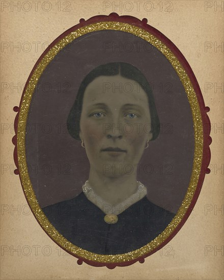 Portrait of woman; United States; 1860s - 1880s; Hand-colored tintype; Sheet: 21 x 16.1 cm, 8 1,4 x 6 5,16 in