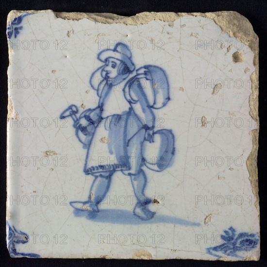 Occupation tile, blue with brazier with hammer, corner motif of ox's head, wall tile tile sculpture ceramic earthenware glaze