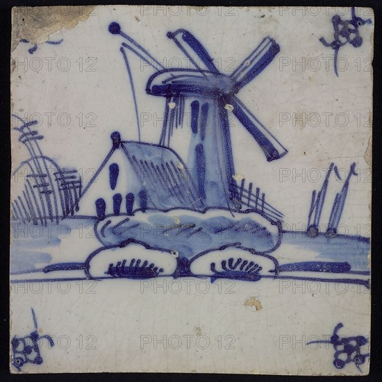 Scene tile, blue with landscape with mill and house, corner motif spider, wall tile tile sculpture ceramic earthenware glaze