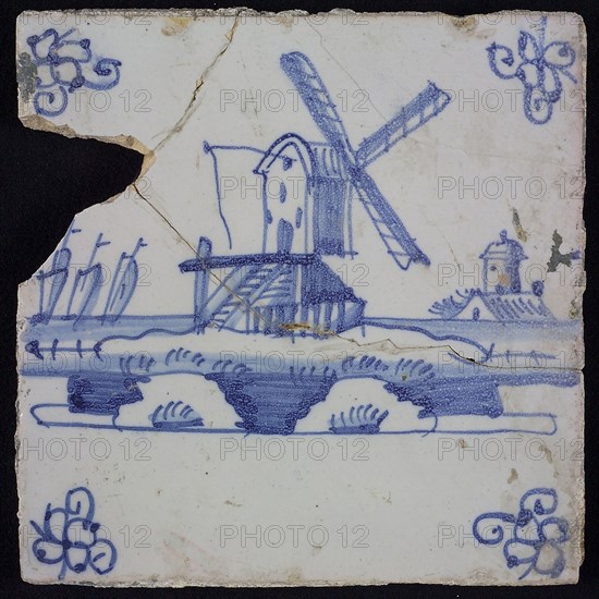 Scene tile, blue with landscape with stand mill, corner motif spider, wall tile tile sculpture ceramic earthenware glaze, baked