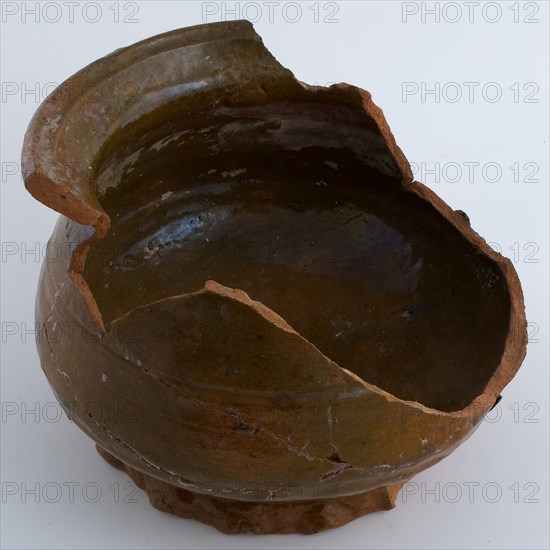 Fragment of earthenware chamber pot on pinched stand, wide neck opening, glazed, pot holder sanitary soil find ceramic