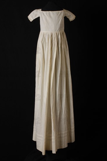 White cotton underdress, lace trim along the sleeves, part of ...