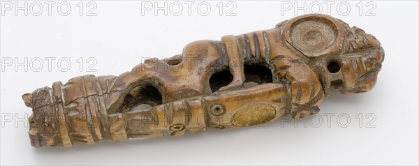 Carved ivory handle, lion with shield, has section of the ground find ivory, cut bored Ivory has the shape of standing lion