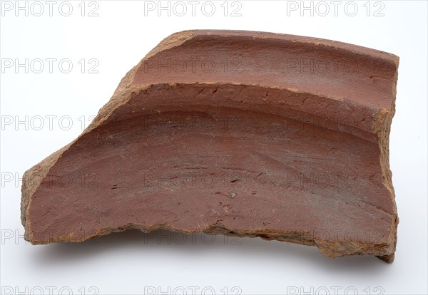 Fragment of red earthenware, partly with glaze, fragment crockery holder kitchen utensils earthenware ceramics earthenware glaze