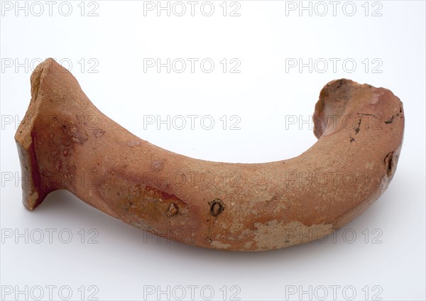 Fragment of red earthenware, partly glazed, fragment crockery holder kitchen utensils earthenware ceramics earthenware glaze