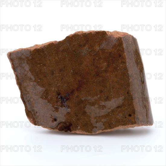 Fragment of red earthenware, partly glazed, fragment crockery holder kitchen utensils earthenware ceramics earthenware glaze