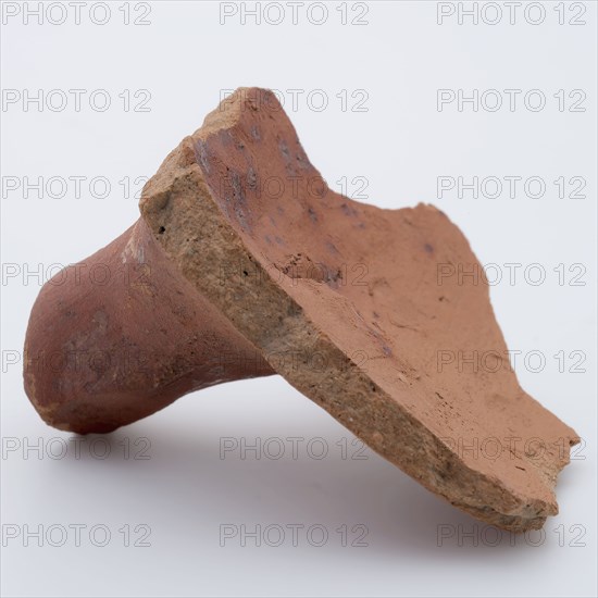 Fragment of red earthenware, partly with glaze, fragment crockery holder kitchen utensils earthenware ceramics pottery glaze