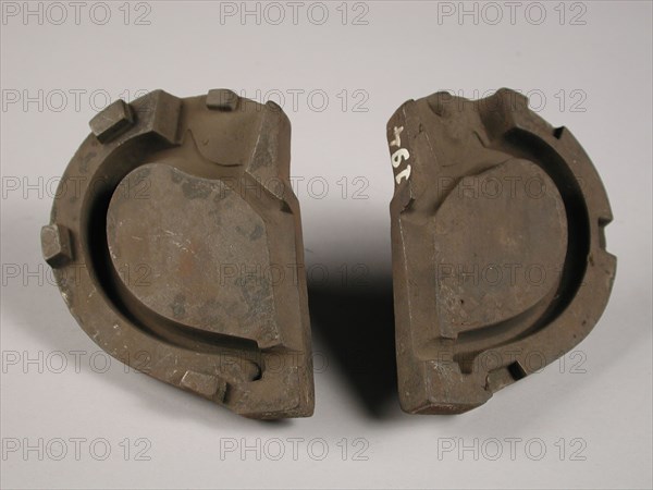 Two parts of three-piece bronze mold for ear of pot or jug, mold casting tool tools equipment base metal bronze, cast Three