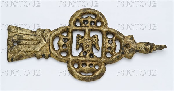 Belt tongue of belt hanger or belt buckle with openwork motifs, centrally stylized eagle, belt accessory ground find copper