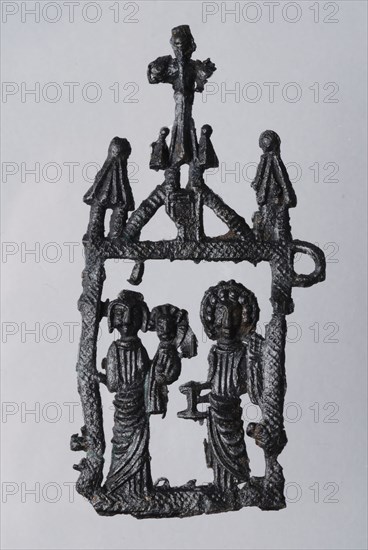 Pilgrim's badge, openwork maria with child, angel with candlestick, pilgrims insignia insignia devotionalia earth discovery tin
