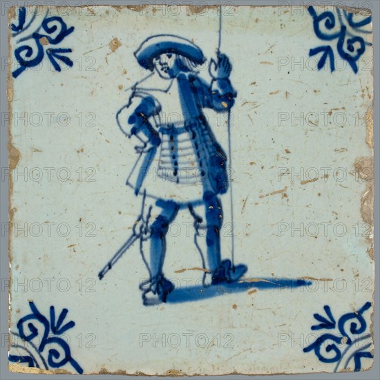 Figure tile, blue on white, warrior with spear, saber and big hat, corner pattern ox head, wall tile tile sculpture ceramics