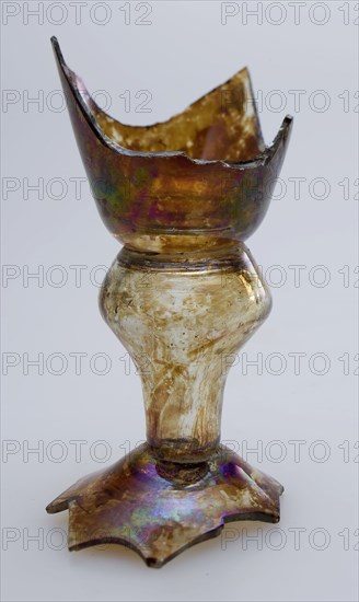 Fragment of part of foot and of stem of goblet, drinking glass drinking utensils tableware holder soil find glass, hand-blown