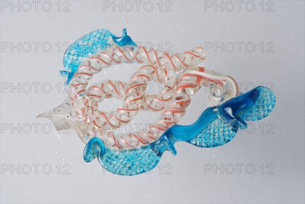 Fragment of stem of wing glass in clear colorless, red and blue glass, drinking glass drinking utensils tableware holder