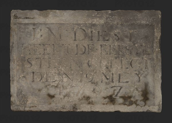 Facing brick with text J.M. Diest laid the first stone on 19 May 1797, facing brick first stone building component sandstone