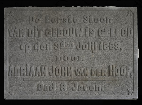 Facade stone with text The first stone ... Van der Hoop ... 1868 ... 8 years, facing brick first stone building part stone