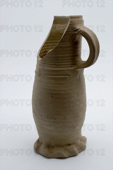 Gray stoneware jug on squeeze foot, jug be found on the bottom of the ceramic stoneware, hand-turned gray stoneware jug be