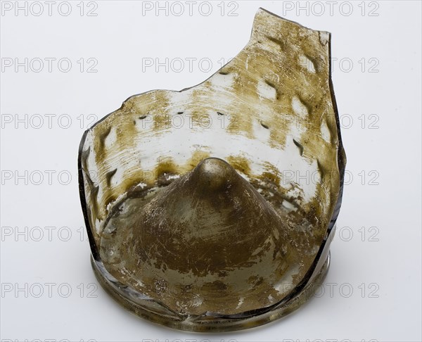Fragment of foot (edge), bottom and part wall of waffle cup, goblet drinking glass drinking utensils tableware holder soil find