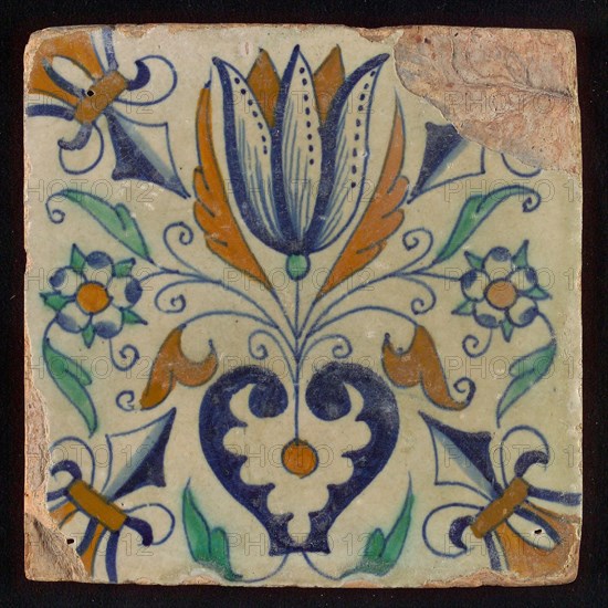 Tile, blue draft, brown, orange and green on white, centrally tulip and heart, corner motif lily, wall tile tile sculpture