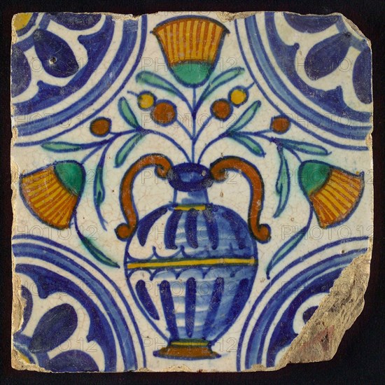 Tile, blue draft, orange, yellow, brown and green on white, central flowerpot with marigolds, corner pattern, rosette, wall tile