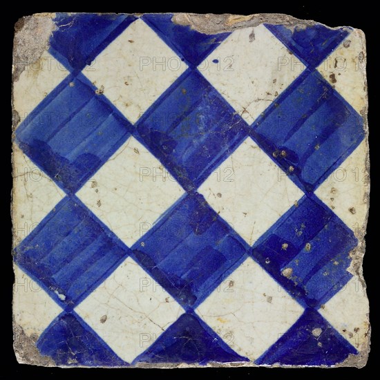 Ornament tile, checkerplate motif, small windows, floor tile tile sculpture ceramic earthenware glaze, Blue on white with dark