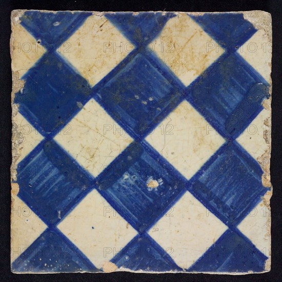 Ornament tile, checkerplate motif, small windows, floor tile tile sculpture ceramic earthenware glaze, Blue on white with dark