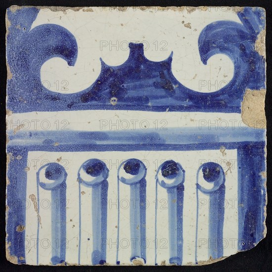 Tile of chimney pilaster, blue on white, part of column with cannelure and capital on which curly ornament, chimney pilaster