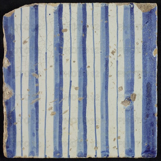 Tile of chimney pilaster, blue on white, part of column with cannelure, chimney pilaster tile pilaster footage fragment ceramic