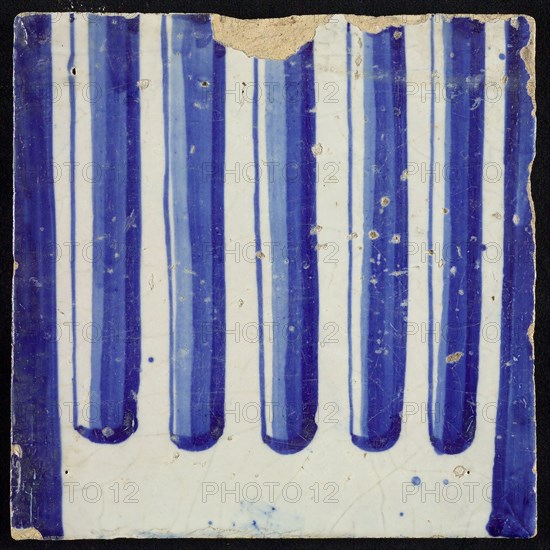 Tile of chimney pilaster, blue on white, part of column with cannelure, chimney pilaster tile pilaster footage fragment ceramics