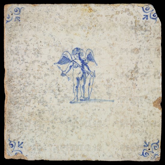 White tile with blue cupid with bow and arrow; corner pattern ox head, wall tile tile sculpture ceramic earthenware glaze, baked