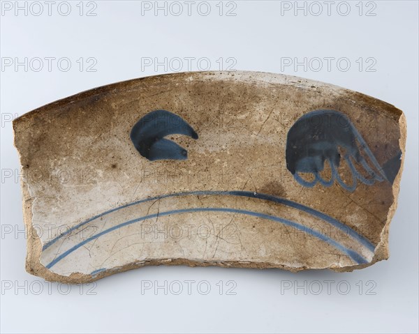 Border fragment of majolica dish decorated with monochrome decor, misbaksel, dish tableware holder fragment earthenware pottery