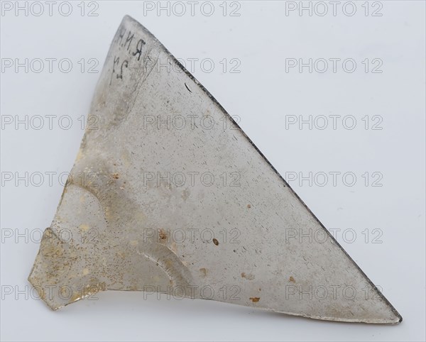 Two fragments of clear beaker, bottom and part of rim, beaker drinking glass drinking utensils tableware holder soil find glass