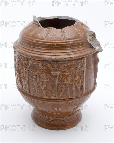 Brown stoneware musketeers jar, around belly musketeers under arcade in high frieze, musketeer jar jug crockery holder soil find