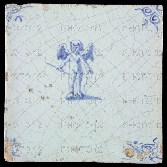 White tile with blue cupid with bow and arrow; corner pattern ox head, wall tile tile sculpture ceramic earthenware glaze, baked