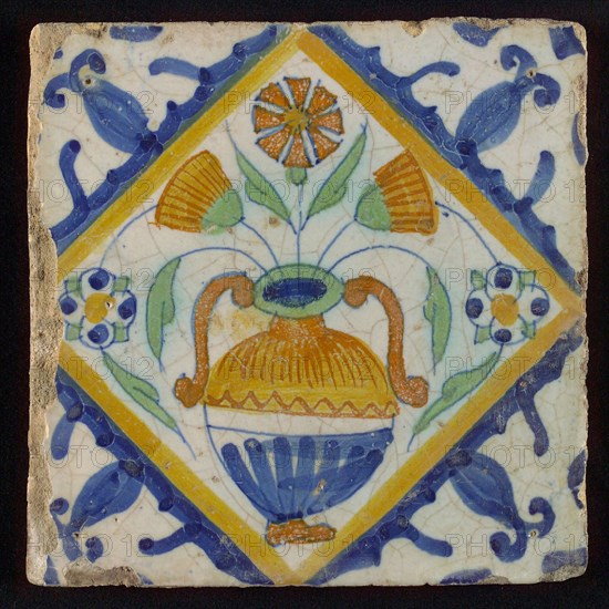 Tile, orange, brown, green and blue on white, flowerpot in square, corner pattern palmet, wall tile tile sculpture ceramic