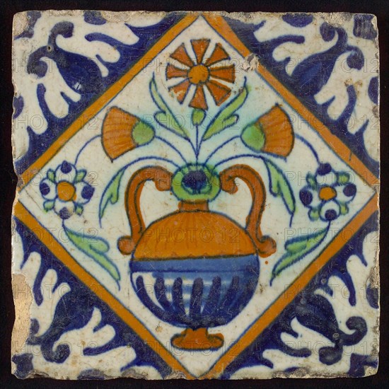 Tile, orange, brown, green and blue on white, flowerpot in square, corner pattern palmet, wall tile tile sculpture ceramic