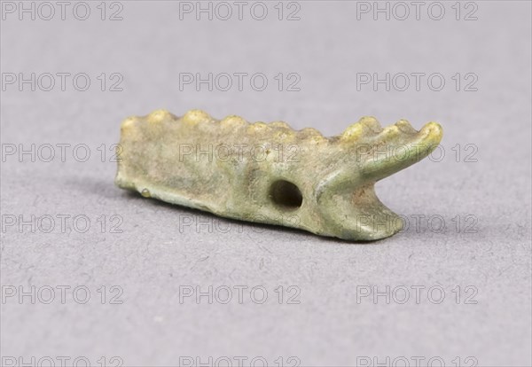 Amulet of a Crocodile, Saite–Late Period (664–332 BC), Egyptian, Egypt, Faience, 1.9 × 0.6 × 0.5 cm (3/4 × 1/4 × 3/16 in.)