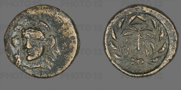 Coin Depicting the Goddess Athena, 371/357 BC, Greek, minted in Phocis, Ancient Greece, Bronze, Diam. 1.6 cm, 2.66 g