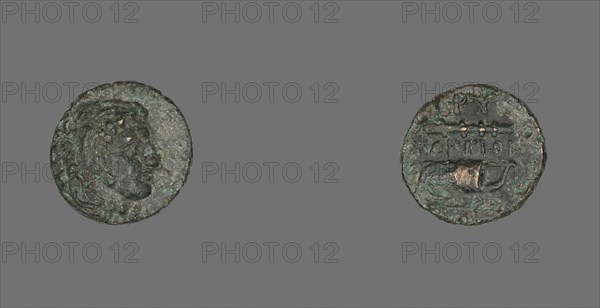 Coin Depicting the Hero Herakles, 387/300 BC, Greek, Ancient Greece, Bronze, Diam. 1.3 cm, 1.64 g