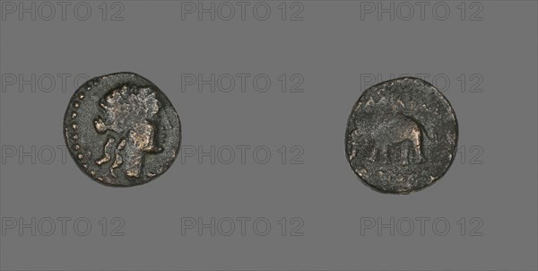 Coin Depicting a Female Head, 223/187 BC, Greek, Ancient Greece, Bronze, Diam. 1.4 cm, 2.58 g